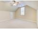 Inviting bedroom with a ceiling fan and a window allowing natural light in at 589 Cook Dr, Ellenwood, GA 30294