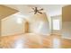Expansive room with hardwood floors, ceiling fan, and natural light, perfect for a flexible living space at 589 Cook Dr, Ellenwood, GA 30294