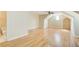 Large bonus room featuring hardwood floors and a ceiling fan, offering ample space for various activities at 589 Cook Dr, Ellenwood, GA 30294