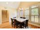 Eat-in kitchen area with windows and a modern chandelier at 589 Cook Dr, Ellenwood, GA 30294