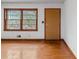 Classic living room featuring hardwood floors and a view of the outdoors at 1678 Capistrana Pl, Decatur, GA 30032