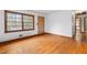 Hardwood floors fill this cozy living room with natural light at 1678 Capistrana Pl, Decatur, GA 30032