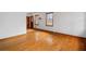 Bright living room featuring hardwood floors and neutral walls at 1678 Capistrana Pl, Decatur, GA 30032