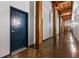 Hallway featuring wooden support beams, concrete floors, and fire suppression equipment at 170 Boulevard Se # H416, Atlanta, GA 30312