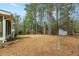 Large, private backyard with mature trees and storage shed at 2142 Graystone Pkwy, Grayson, GA 30017