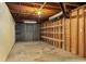 Basement with exposed utilities and framing, offering storage or potential for finishing to add living space at 2142 Graystone Pkwy, Grayson, GA 30017