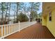 Spacious wooden deck with white railings, perfect for outdoor entertaining and relaxation at 2142 Graystone Pkwy, Grayson, GA 30017