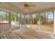 Relaxing screened porch with wood flooring and a view of the backyard at 2142 Graystone Pkwy, Grayson, GA 30017