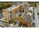 Aerial view of mixed-use community, showcasing modern buildings, street parking, and a vibrant urban environment at 2601 Boulder Way, Woodstock, GA 30188