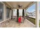 Covered back patio with patio furniture and a stone floor at 2601 Boulder Way, Woodstock, GA 30188