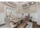 Dining room with a large table, bench seating, and elegant chandelier at 2601 Boulder Way, Woodstock, GA 30188