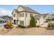 Beautiful two-story home featuring a covered porch and well-maintained lawn at 2601 Boulder Way, Woodstock, GA 30188