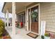 Inviting front porch with rocking chairs and stylish decor at 2601 Boulder Way, Woodstock, GA 30188