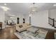 Spacious living room featuring hardwood floors and an open layout at 2601 Boulder Way, Woodstock, GA 30188