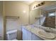 Bathroom featuring vanity, mirror and shower/tub combo at 541 Exam Ct, Lawrenceville, GA 30044