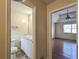 Bathroom with vanity sink and door leading to bedroom at 541 Exam Ct, Lawrenceville, GA 30044