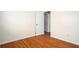 Bedroom with hardwood floors, and white trim around the baseboards at 541 Exam Ct, Lawrenceville, GA 30044