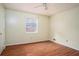 Bedroom featuring hardwood floors and a ceiling fan at 541 Exam Ct, Lawrenceville, GA 30044