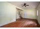 Living room featuring a staircase and wood flooring at 541 Exam Ct, Lawrenceville, GA 30044