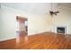 Open living room features vaulted ceilings, fireplace and hardwood floors at 541 Exam Ct, Lawrenceville, GA 30044