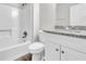 Modern bathroom featuring granite countertop, gray vinyl flooring and white tile shower at 1765 Round Rd, Grayson, GA 30017