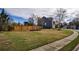 Spacious backyard with a well-maintained lawn and a wooden fence adding privacy at 3028 Hallman Cir, Marietta, GA 30064