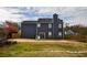 Spacious backyard featuring an expansive patio and a wooden fence at 3028 Hallman Cir, Marietta, GA 30064