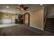 Finished basement offers a bar area, stairs to the upper level and arched doorway at 3028 Hallman Cir, Marietta, GA 30064