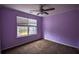 Bedroom featuring carpeting, a ceiling fan, and natural light from a window at 3028 Hallman Cir, Marietta, GA 30064