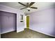 Bedroom featuring carpeting, a ceiling fan, and a closet at 3028 Hallman Cir, Marietta, GA 30064