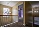 Hallway with a view of a bedroom with neutral colors and carpet flooring at 3028 Hallman Cir, Marietta, GA 30064