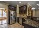 Kitchen area features stainless steel appliances and a granite countertop at 3028 Hallman Cir, Marietta, GA 30064