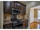 Well-equipped kitchen with granite countertops and stainless steel appliances at 3028 Hallman Cir, Marietta, GA 30064