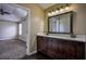 Stylish primary bathroom with a double vanity, natural light, and an adjacent bedroom view at 3028 Hallman Cir, Marietta, GA 30064