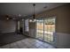 Living area with sliding door access to the backyard patio at 3028 Hallman Cir, Marietta, GA 30064