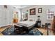 Comfortable bedroom featuring hardwood floors, modern decor and an ensuite bathroom at 3321 Raes Creek Rd # 11, Marietta, GA 30008