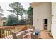 Enjoy the view from the spacious deck, perfect for outdoor entertaining and relaxation at 480 Shore Drive, Suwanee, GA 30024