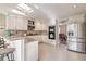 Spacious kitchen featuring a breakfast bar and stainless steel appliances at 480 Shore Drive, Suwanee, GA 30024