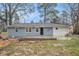 View of the backyard of the home with new patio space at 2212 Brannen Se Rd, Atlanta, GA 30316