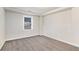 Cozy bedroom offering neutral paint, fresh carpet, and ample natural light at 2212 Brannen Se Rd, Atlanta, GA 30316