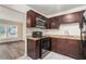 Functional kitchen with stainless steel appliances and tile flooring at 2212 Brannen Se Rd, Atlanta, GA 30316