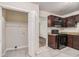Well-lit kitchen with matching stainless steel appliances and convenient laundry access at 2212 Brannen Se Rd, Atlanta, GA 30316
