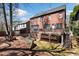 Exterior of home, with a backyard firepit and deck at 29 Cliftwood Dr, Sandy Springs, GA 30328