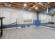 Spacious basement gym with weights and a mirrored wall at 29 Cliftwood Dr, Sandy Springs, GA 30328