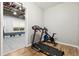 Finished basement with a home gym including both a treadmill and stationary bike at 29 Cliftwood Dr, Sandy Springs, GA 30328