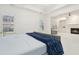 Large bedroom with a view of a fireplace and sitting area, enhanced by ample natural light at 29 Cliftwood Dr, Sandy Springs, GA 30328