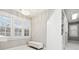 Bright walk-in closet with natural light, custom shelving, and elegant design at 29 Cliftwood Dr, Sandy Springs, GA 30328
