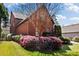 Charming brick home featuring well-maintained landscaping and mature trees in a desirable neighborhood at 29 Cliftwood Dr, Sandy Springs, GA 30328