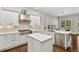 Bright, modern kitchen with white cabinetry, stainless steel appliances, and a center island at 29 Cliftwood Dr, Atlanta, GA 30328