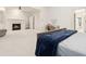 Expansive main bedroom with a fireplace, vanity, and access to an en-suite bathroom at 29 Cliftwood Dr, Sandy Springs, GA 30328